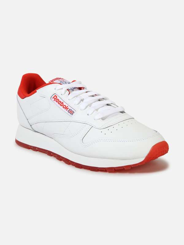 All white reebok online shoes