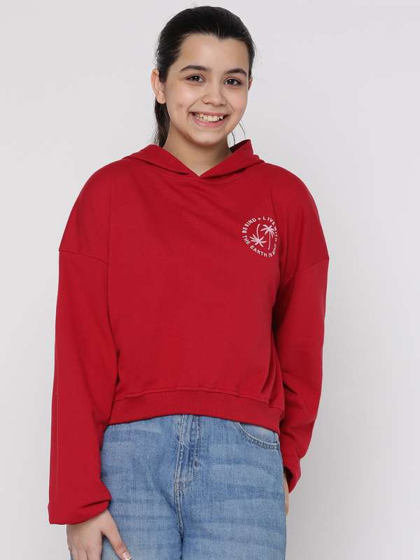 Girl in red top sweatshirt