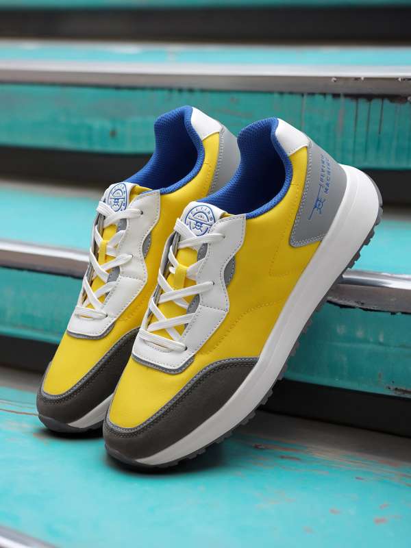 Sneakers with yellow top