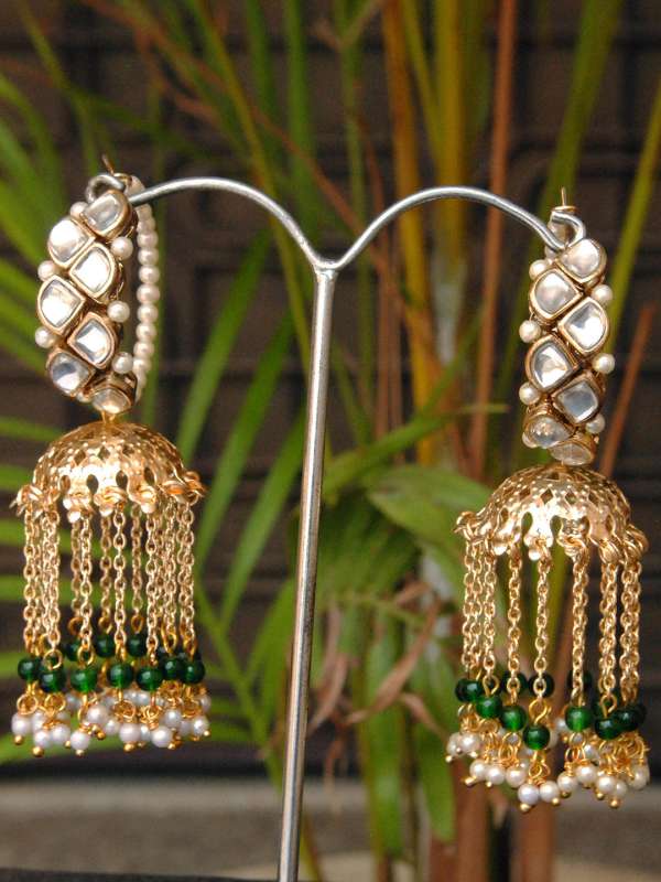 Simple gold jhumka store design