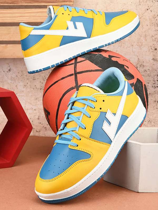 Yellow and white best sale sneakers