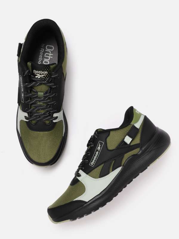 Reebok store green shoes