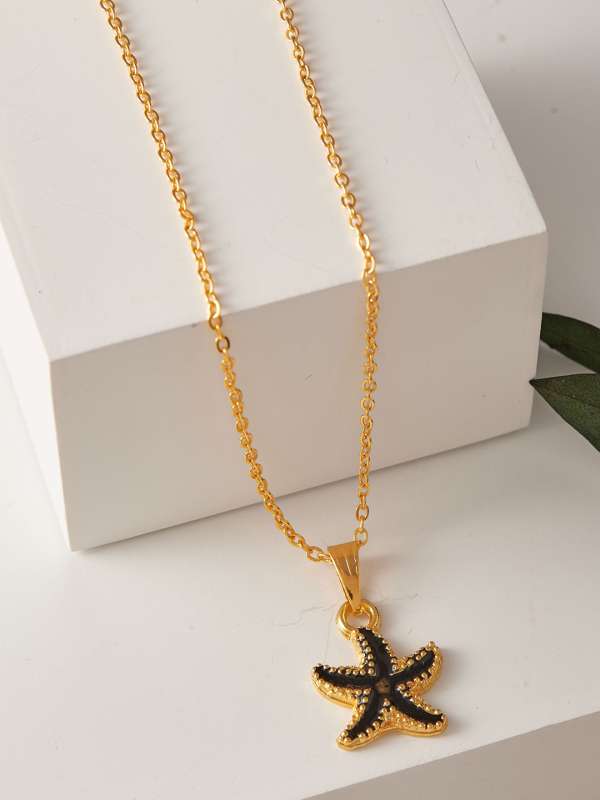 Gold chain outlet with black pendant