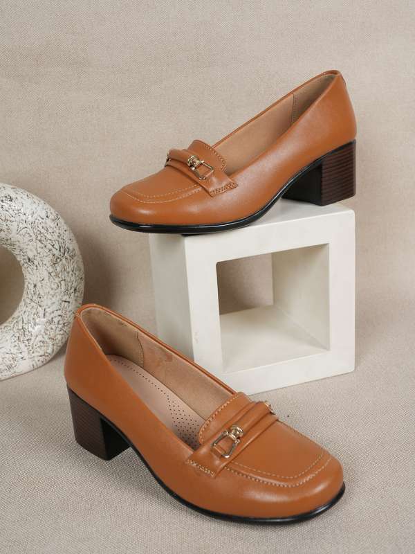 Tan block heel outlet pumps