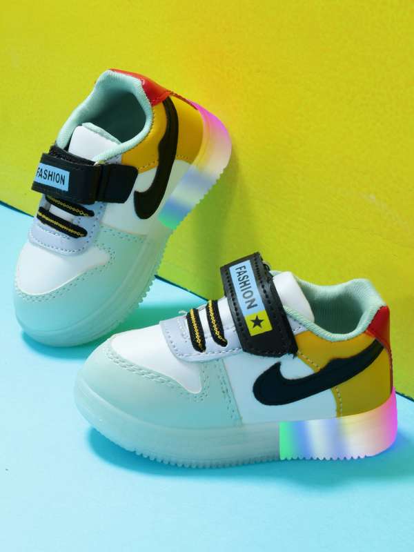 Boys green nikes best sale