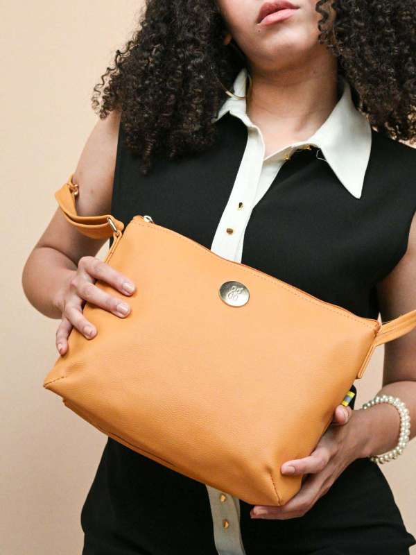 Baggit mustard yellow solid sling bag 2025