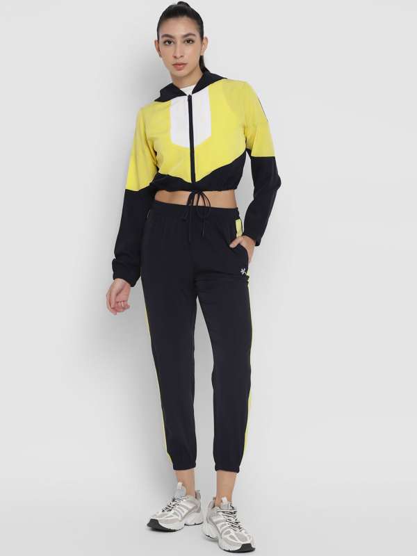 Black and yellow tracksuit deals