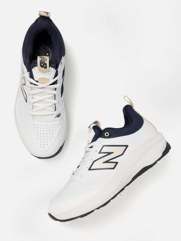 Mens new balance white sneakers hotsell