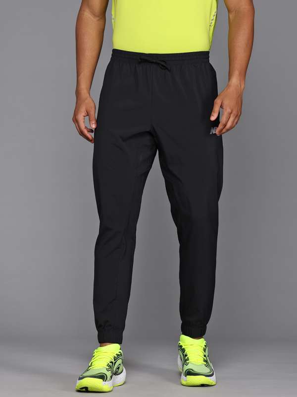 Buy New Balance Men Fast Drying Sport Essentials Woven Running Jogger Track Pants for Men 30683113 Myntra