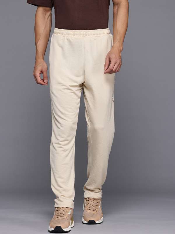 Off White Yellow Men Track Pants Buy Off White Yellow Men Track Pants online in India