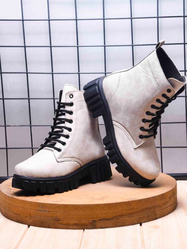 Shop the Latest Collection of Women s Boots Online at Myntra