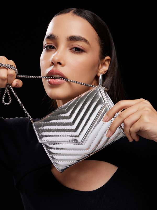 Women Clutches Kazo S.oliver W Red Tape Valiosaa Ted Lapidus Buy Women Clutches Kazo S.oliver W Red Tape Valiosaa Ted Lapidus online in India
