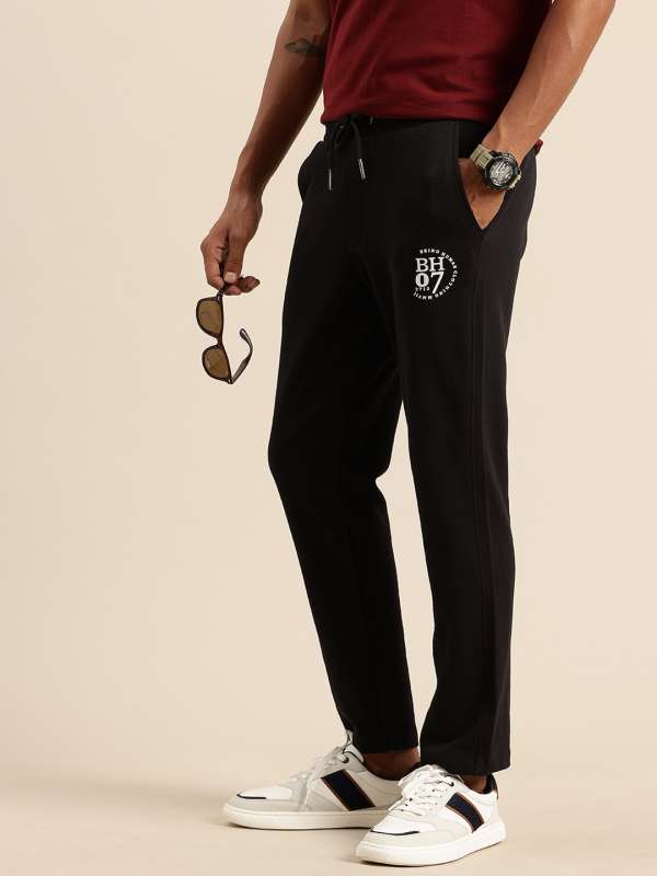 Crusoe track pants shop