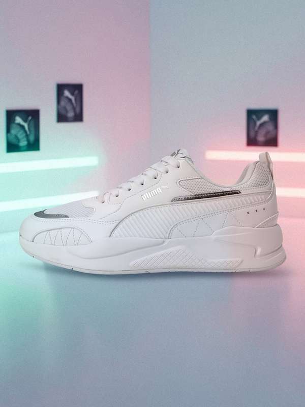 white puma shoes with gold