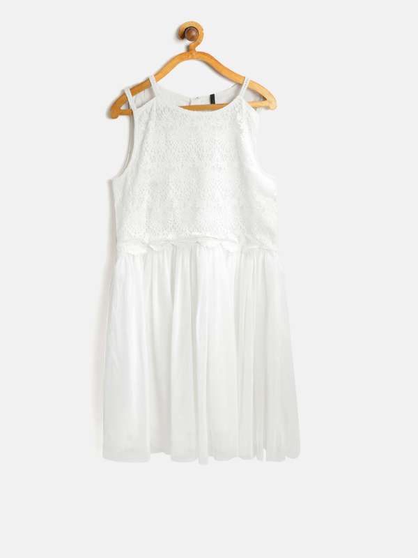 United Colors Of Benetton Dresses Buy United Colors Of Benetton Dresses Online In India Shifts to party dresses, our benetton women's dresses edit has all the latest trends | free uk delivery & returns you can wear a benetton dress for any kind of occasion. united colors of benetton dresses buy