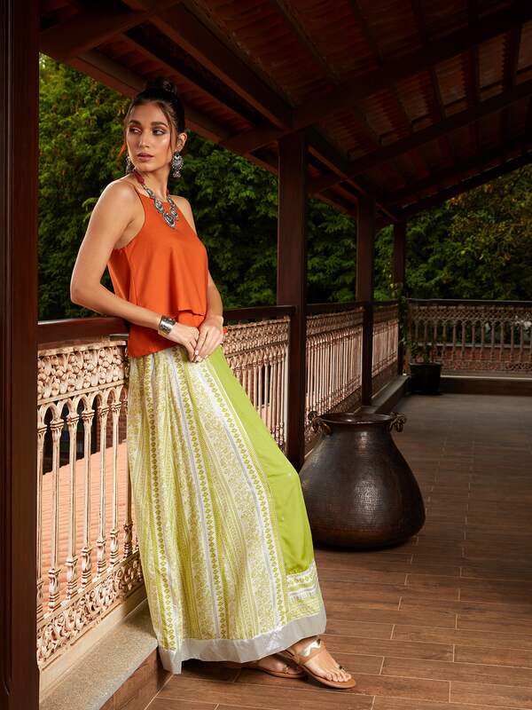 Yellow embroidered top with pista green tafetta silk skirt  Aharin by  Prasansha