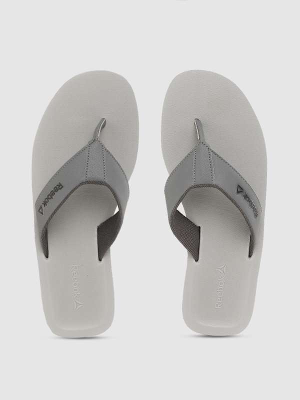 reebok slippers myntra