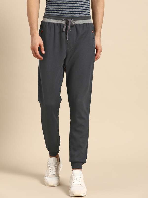 Buy HERE&NOW Men Teal Blue Solid Track Pants on Myntra | PaisaWapas.com