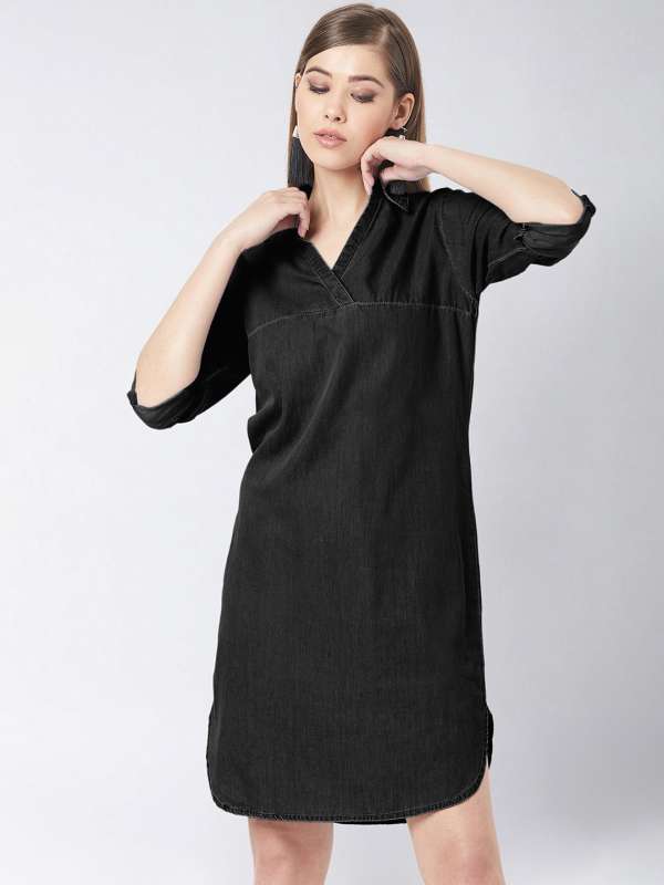 Black dress store with jean shirt