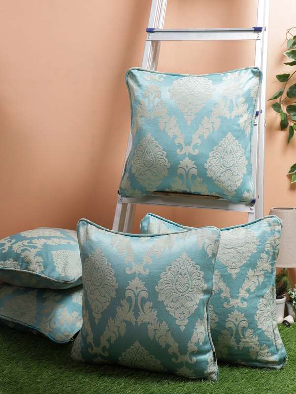 Aqua hot sale blue cushions