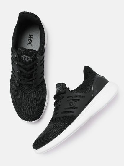 solid black running shoes