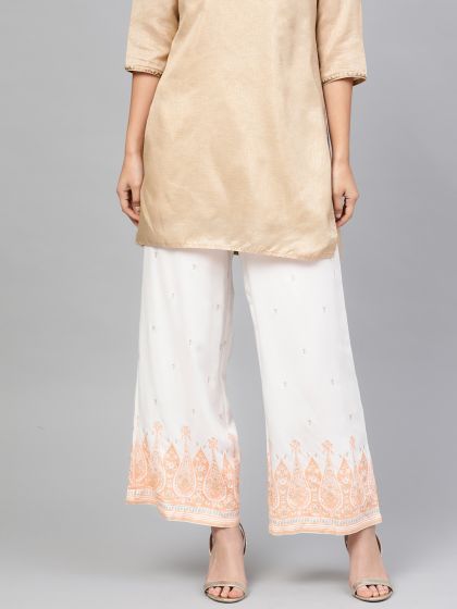 CREAM PALAZZO PANT SET WITH A MULTI COLOURED PANELLED BROCADE TOP PAIRED  WITH A MATCHING DUPATTA AND GOLD DETAILS  Seasons India