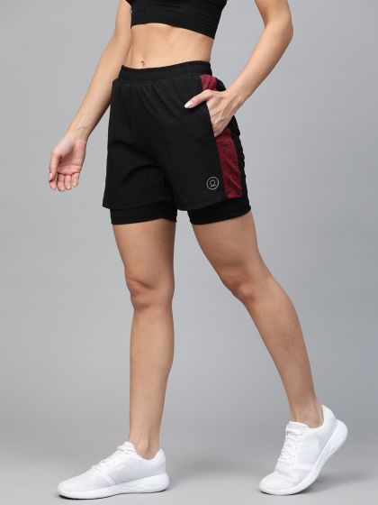 Buy HRX By Hrithik Roshan Women Blue Solid Regular Fit Sports Shorts With  Attached Tights - Shorts for Women 2528638