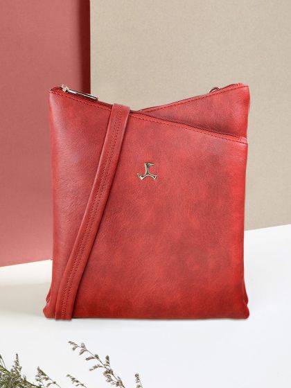 Baggit red solid sling bag outlet