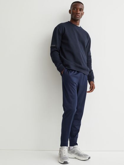 Reebok men's speedwick knit trackster hot sale