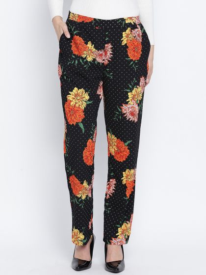 Patterned cigarette trousers  BlackLarge floral  Ladies  HM IN