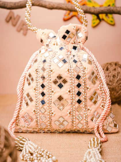 Buy Tarusa Pink Mirror Work Art Silk Potli Bag - Clutches for Women 946548  | Myntra