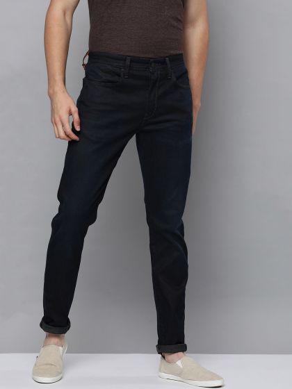 Buy Levis Men Blue Tapered Fit Mid Rise Clean Look Stretchable