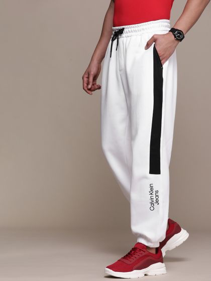 Calvin klein jeans joggers with logo stripe deals