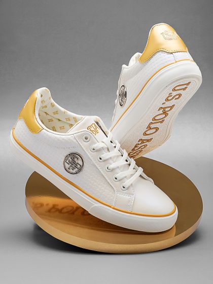 Puma shoes with gold sales buckle