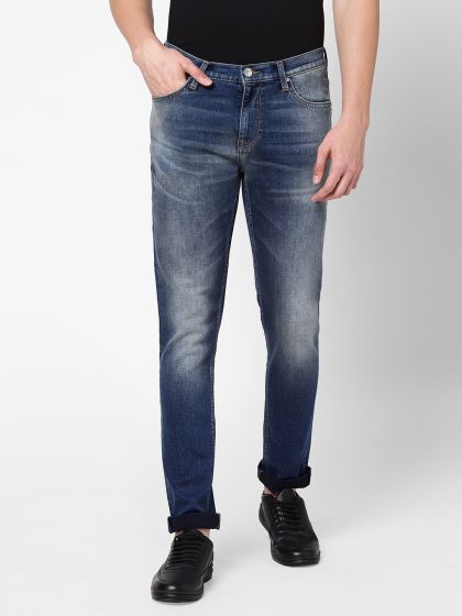 Buy Lee Men Blue Travis Slim Fit Mid Rise Clean Look Stretchable