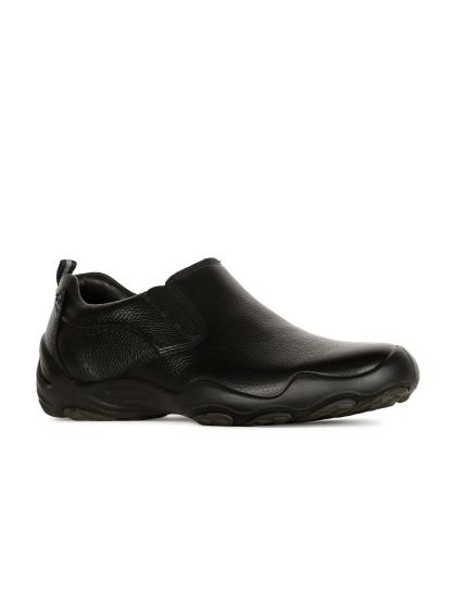 Black and deals white hush puppies