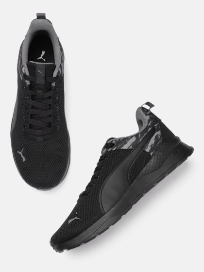 Nike viale triple black top