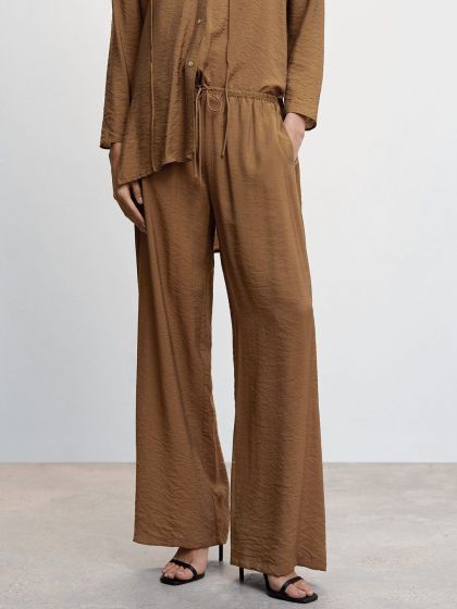 Buy MANGO Women Cream Coloured Regular Fit Solid Parallel Trousers   Trousers for Women 4043848  Myntra