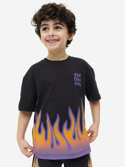 Boys black and gold nike shirt deals