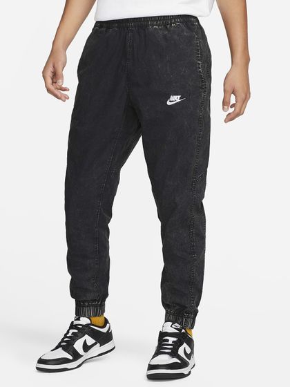 Buy Nike Men Black Solid SPOTLIGHT DRI FIT Technology Joggers - Track Pants  for Men 7616658 | Myntra