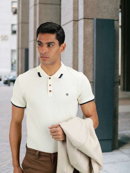 WROGN Men
                        Cream-Coloured Solid Polo Collar Pure Cotton
                        T-shirt