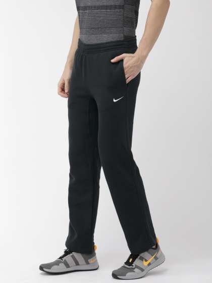 nike track pants mens price