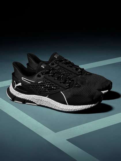 grey and black puma shoes