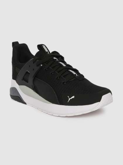 all black puma tennis shoes