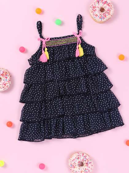 Nauti Nati Girls Navy
                    Blue Printed Layered A-Line Dress with Bow Detail
                    with Tassels