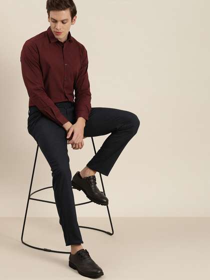 INVICTUS Men Maroon
                      Regular Fit Solid Sustainable Formal Shirt