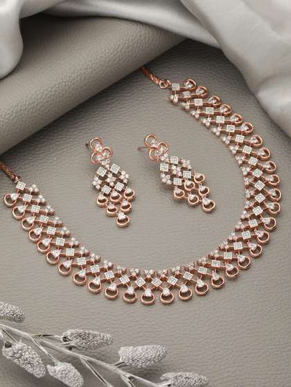 Saraf RS Jewellery
                          Rose Gold-Plated White AD-Studded Handcrafted
                          Jewellery Set