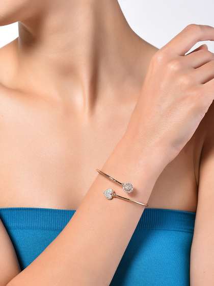 Zaveri Pearls Women
                        Rose Gold Brass Cubic Zirconia Rose Gold-Plated
                        Kada Bracelet