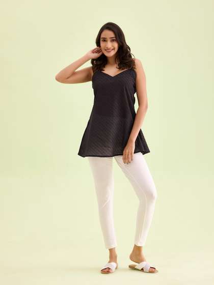 Go Colors Women
                        Cream-Coloured Solid Ankle-Length Leggings