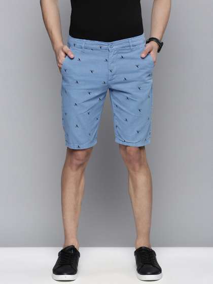 The Indian Garage Co
                        Men Blue Conversational Printed Slim Fit Regular
                        Shorts